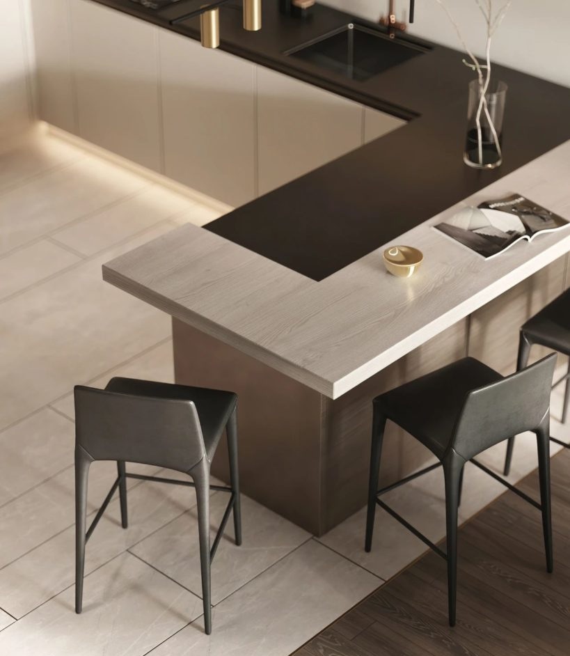 現代中島設計案例：黑色石材與輕木紋異材質拼接中島，延伸出高低層次吧台區，為現代公寓打造機能與美感兼具的輕食用餐空間。