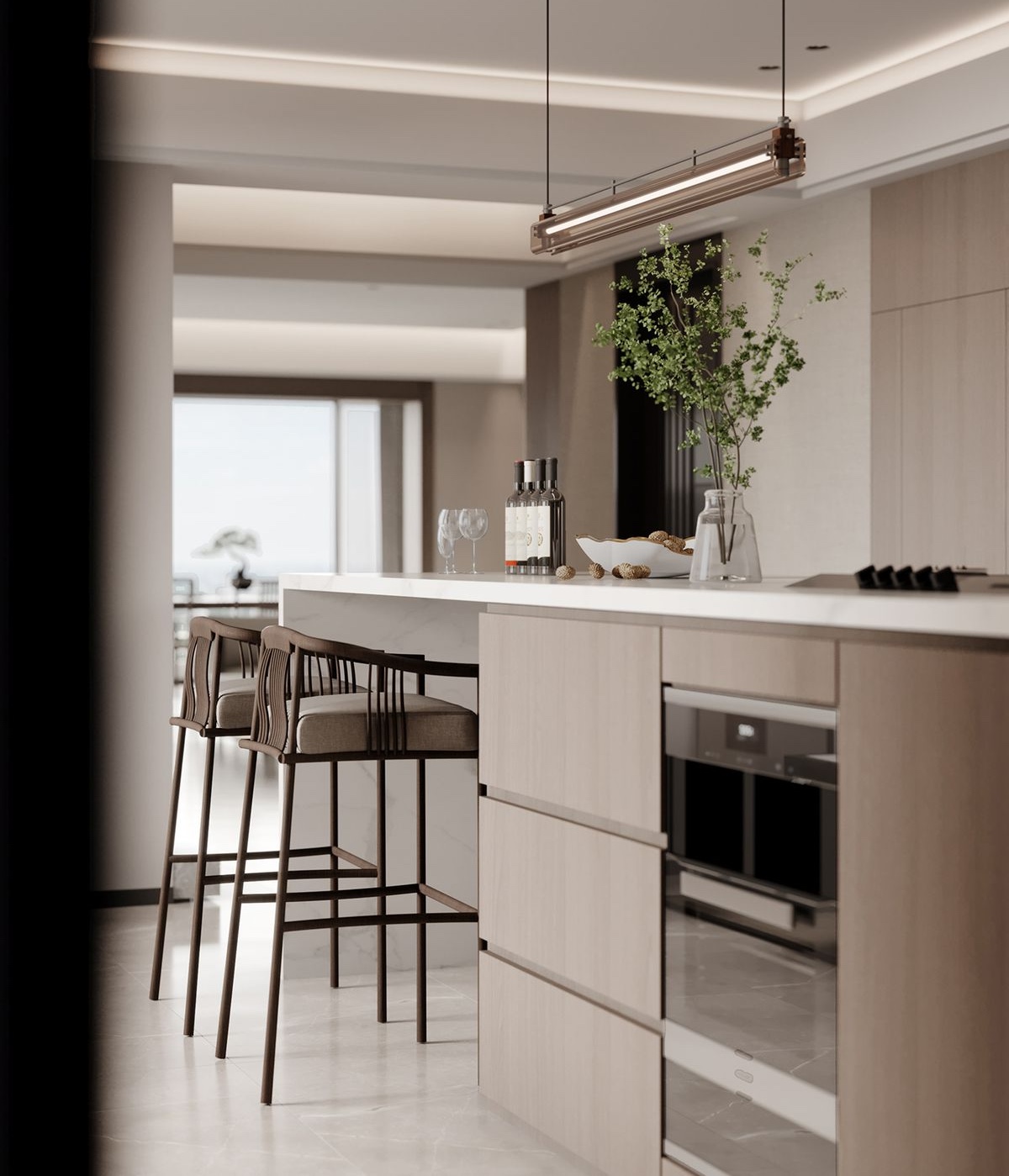 現代收納中島設計案例：大理石檯面整合內嵌式家電與收納機能，搭配精緻長型金屬吊燈，打造兼具專業烹飪與居家社交的高質感核心空間。